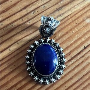 Happy Piasso tradition made sterling lapis pendant with hand made conch stars